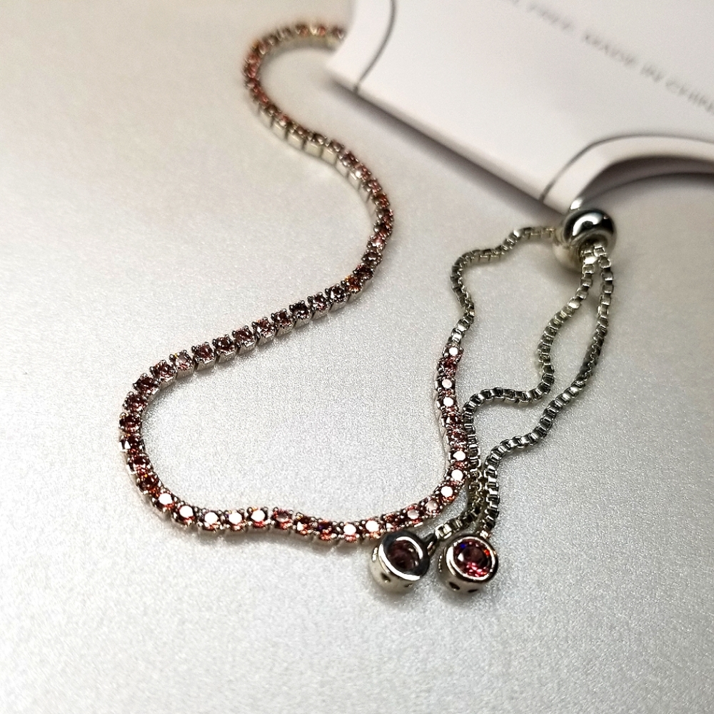 Bolo Bracelet, Rhodium plated Sterling Silver with Darker Pink Rinstones